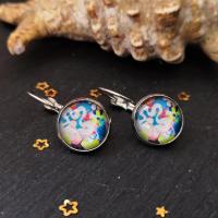 Boucles d oreilles argentees a fleurs 2 