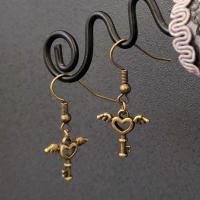 Boucles d oreilles once upon a time cles coeur aile en bronze 1 