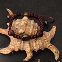 bracelet celtique marron, perle triskell
