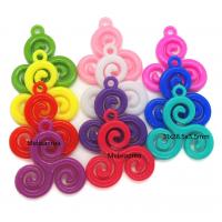 Lot de 11 pendentifs triskel mesure