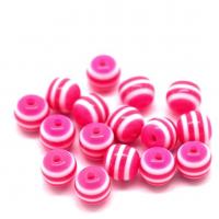 Perle en resine rayee rose et blanche 6mm
